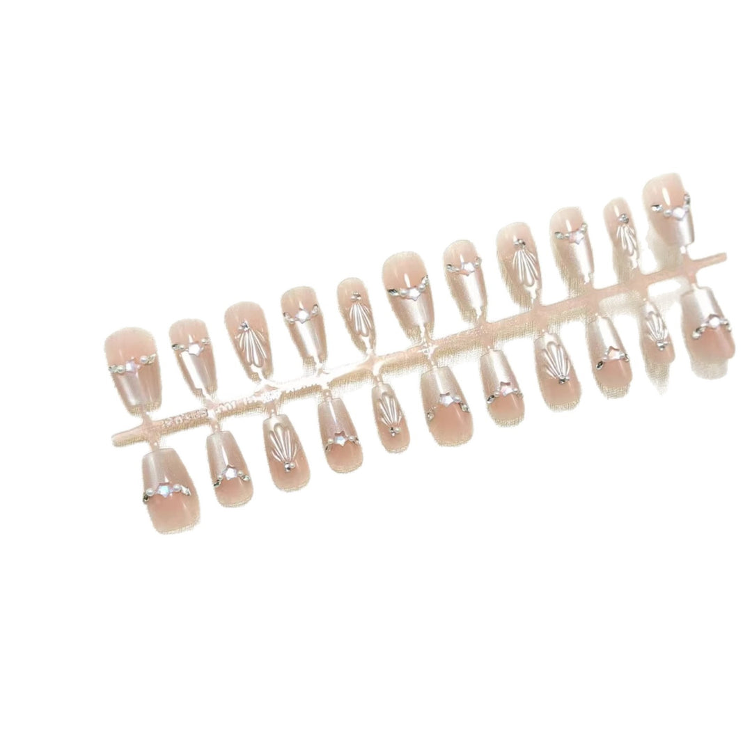 Glamorous artificial nails with filigree 3D decorations Stornfield