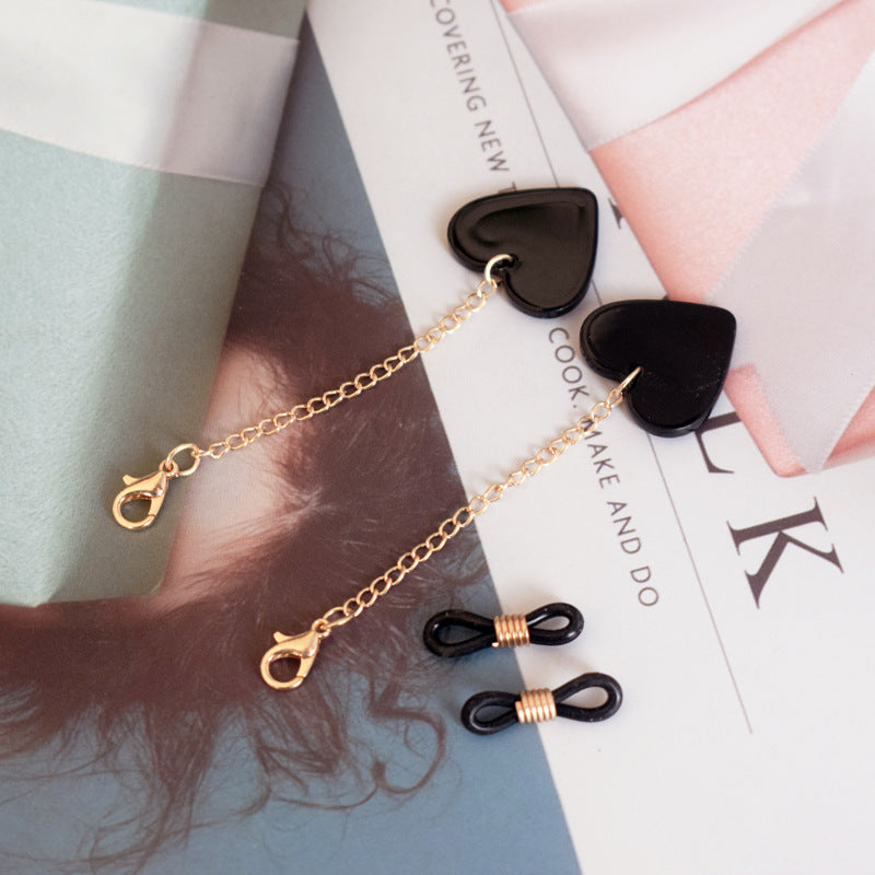 Heart-Shaped Dangle Earrings with Gold Chain Stornfield