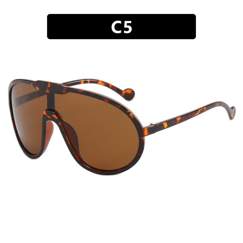 Women’s sporty sunglasses with wide frame and yellow lenses Stornfield