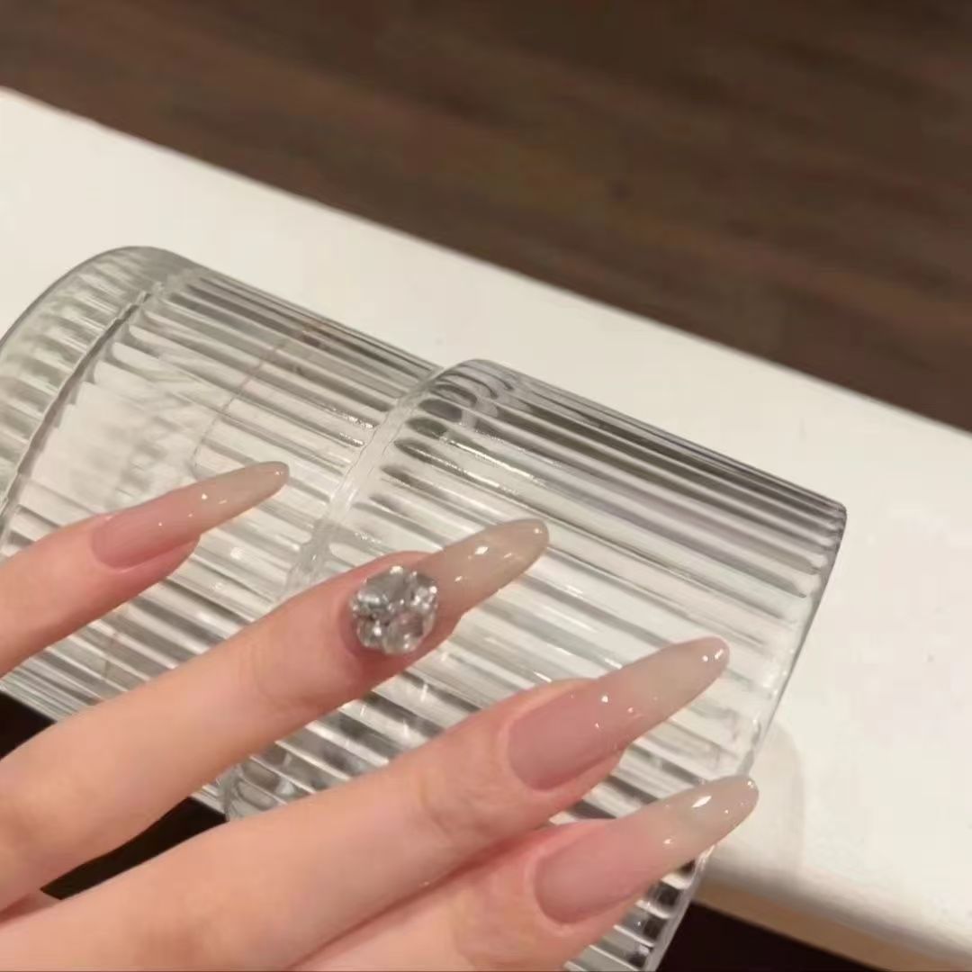 Elegant artificial nails with glitter and crystal accents Stornfield