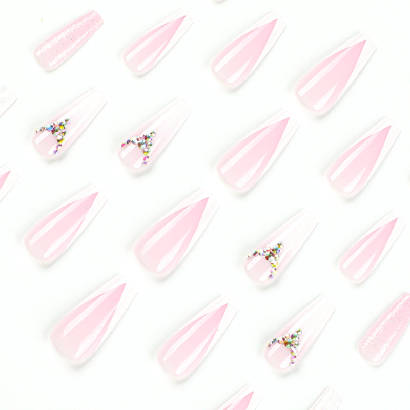 Artful Nail Extensions with Glitter and Rhinestone Accents Stornfield
