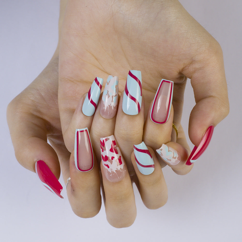 Artificial nails with modern wave pattern and heart accents Stornfield