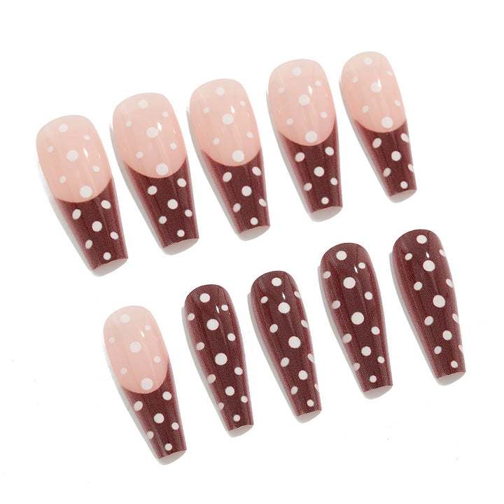 Artificial nails in the popular polka dot design Stornfield