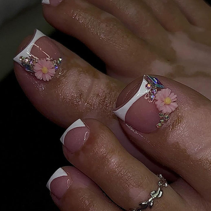 Nail design with floral accents Stornfield