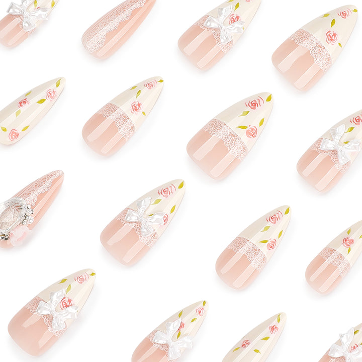 Artful stiletto nails with floral accents and glitter accents Stornfield