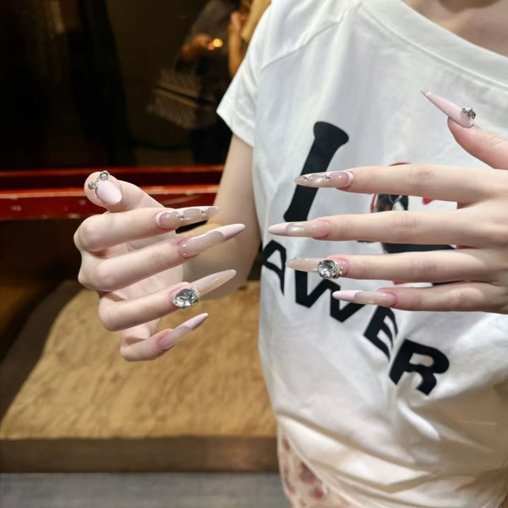 Glamorous Stiletto Nail Art Extensions with Crystal Accents