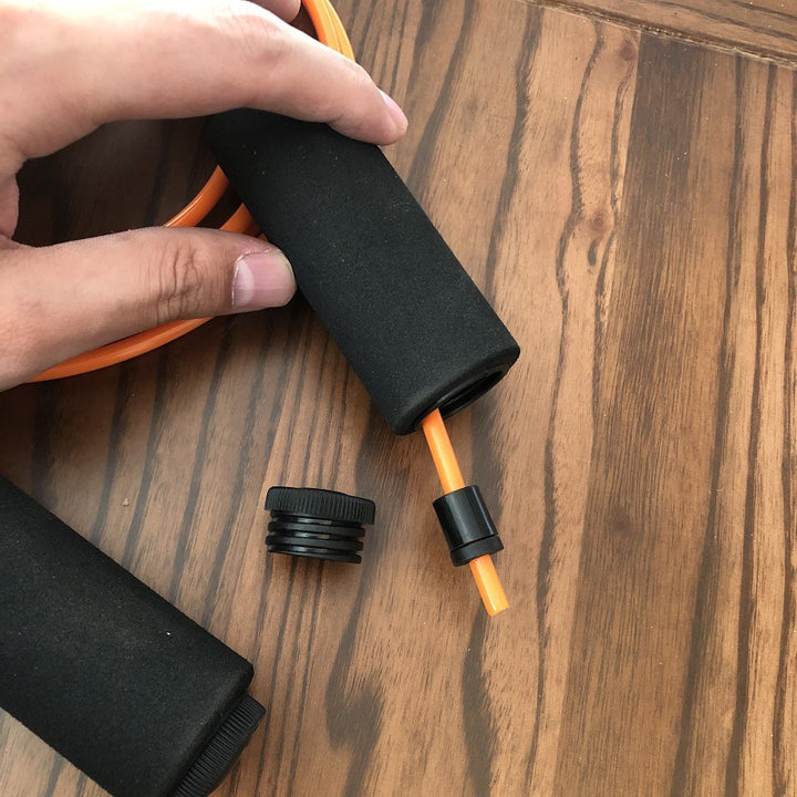 Jump rope with non-slip grips and adjustable cord Stornfield