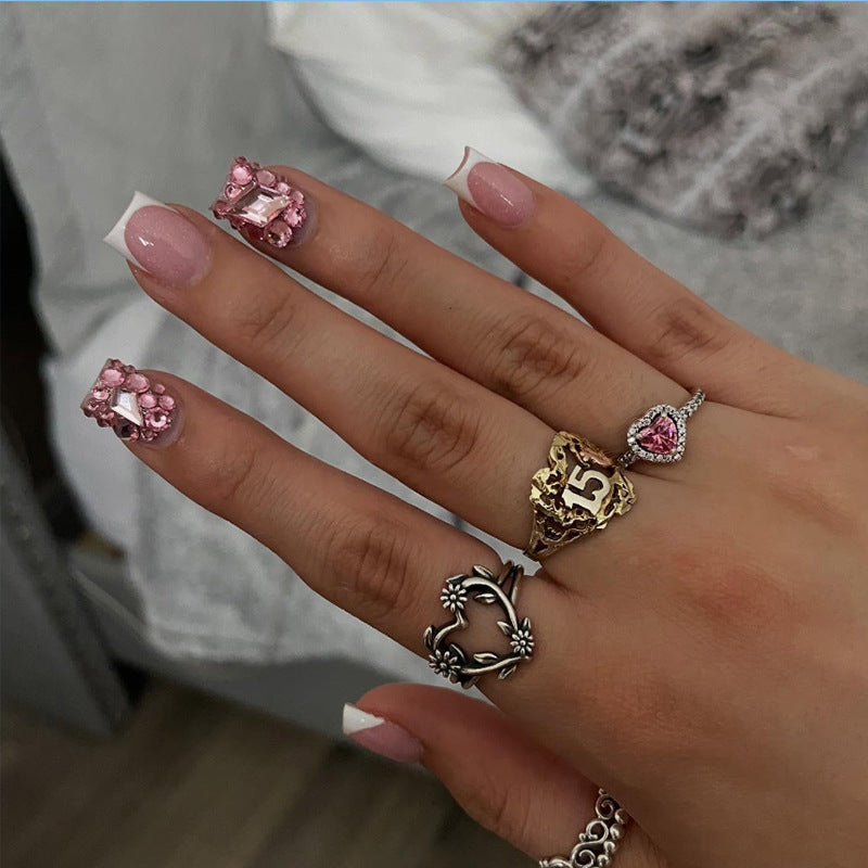 Artificial nail set with glamorous rhinestone decorations Stornfield