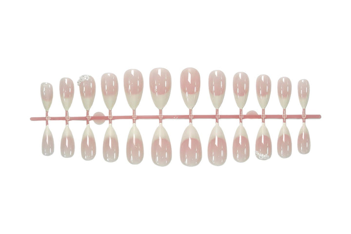 Acrylic nail set with elegant French tip and extravagant decorative details Stornfield
