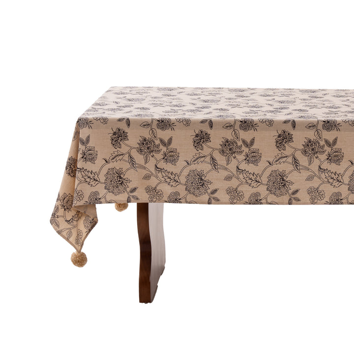 Woven tablecloth with ethnic Aztec pattern and pompom tassels