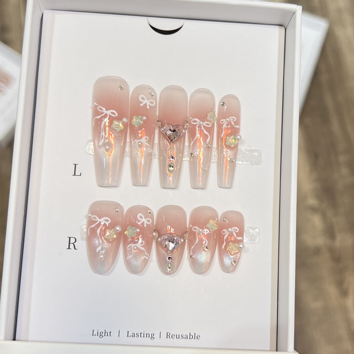 Elegant Press-On Nail Art Set with Chic Ribbon and Gem Accents Stornfield