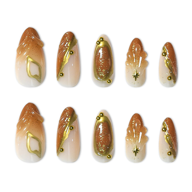 Luxurious Press-On Nail Set with Ornate Gold Detailing Stornfield
