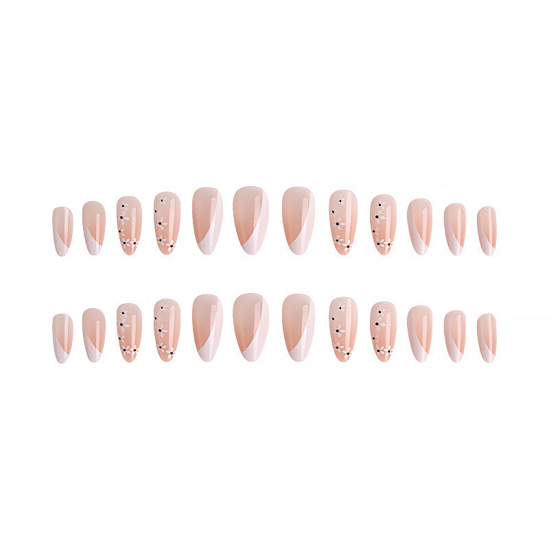 Artistic Nail Tips with Floral Accents Stornfield