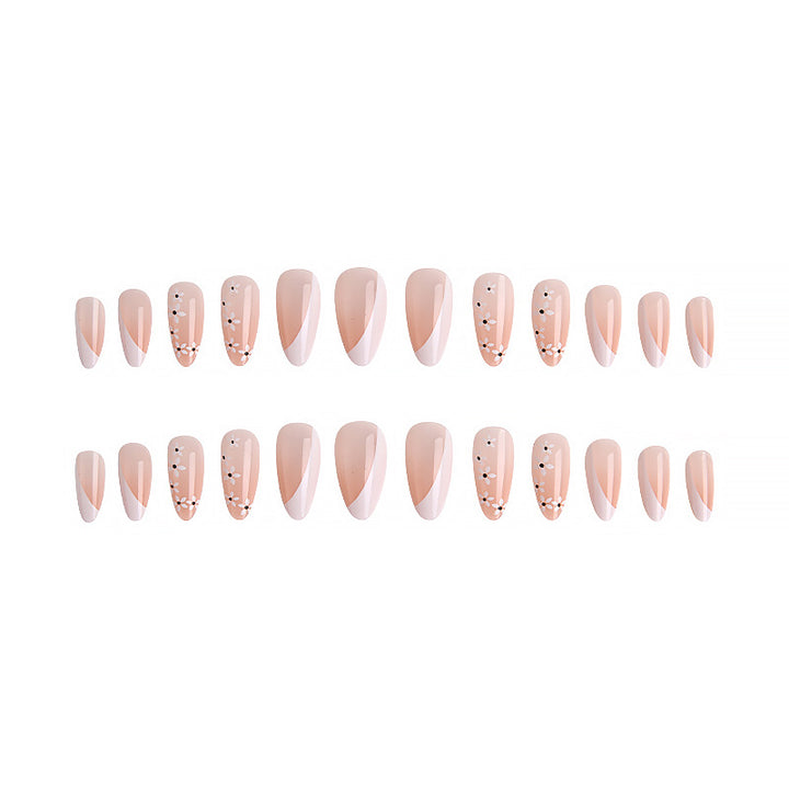 Artistic Nail Tips with Floral Accents Stornfield