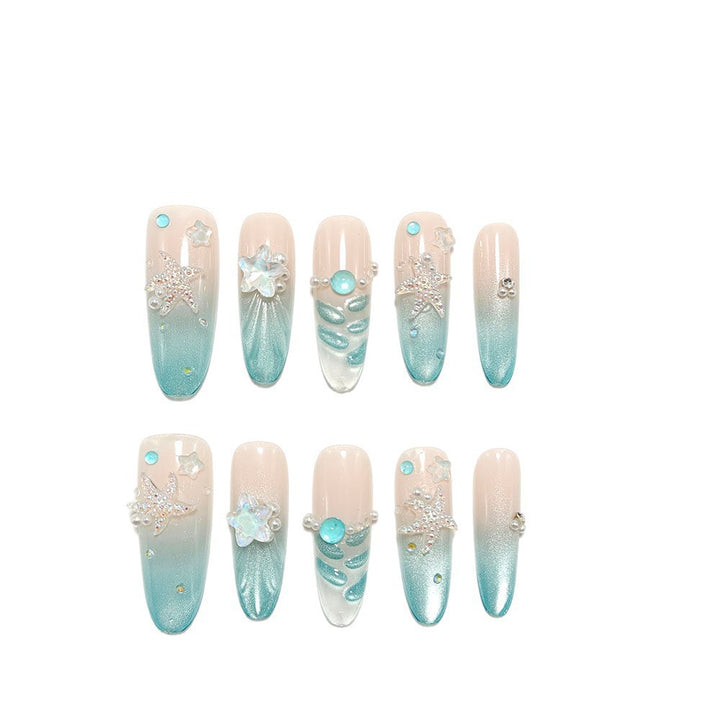 Elegant Nail Art with Ocean Theme and 3D Accents Stornfield