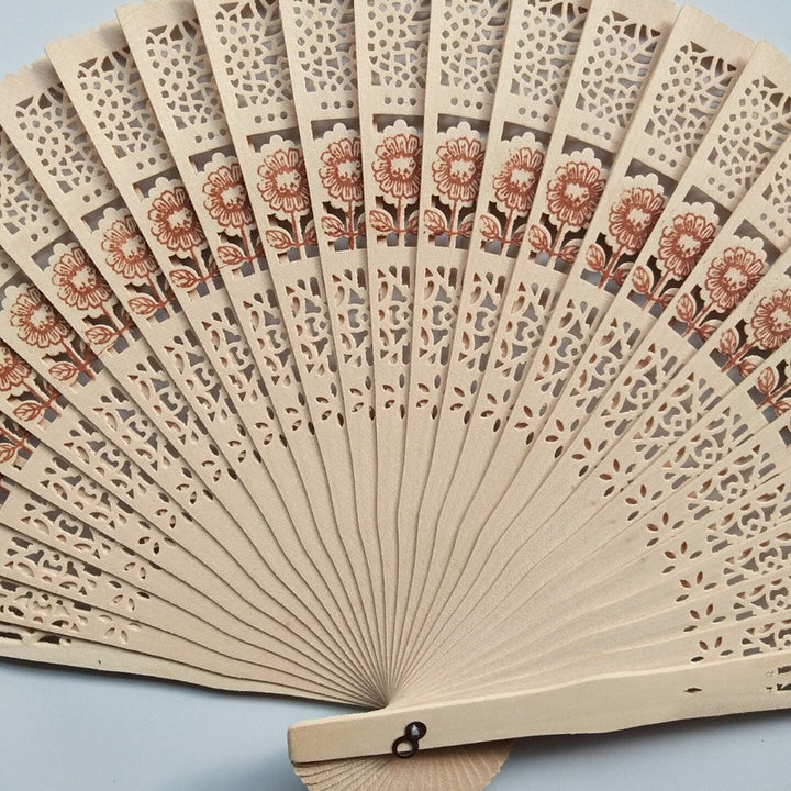 Ladies decorative hand fan made of high-quality wood with intricate cut-out work Stornfield