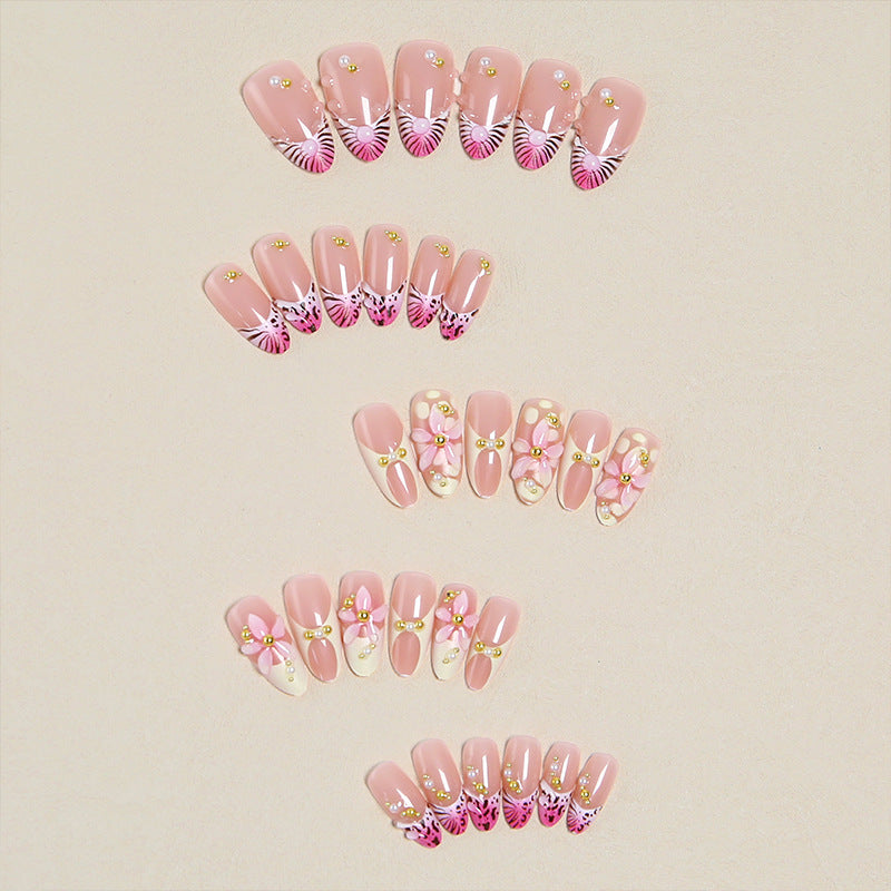 Artful artificial nails with delicate flower patterns Stornfield
