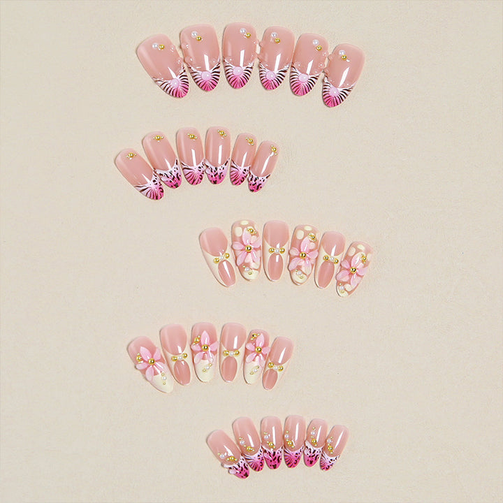Artful artificial nails with delicate flower patterns Stornfield