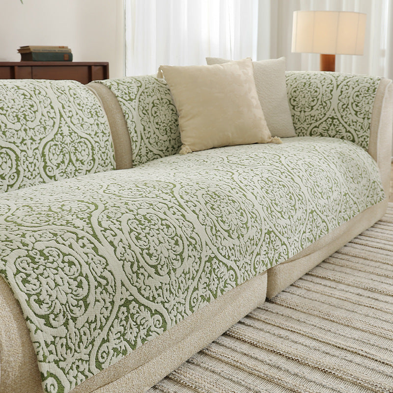 three-seater sofa with removable jacquard protective covers and curved armrests