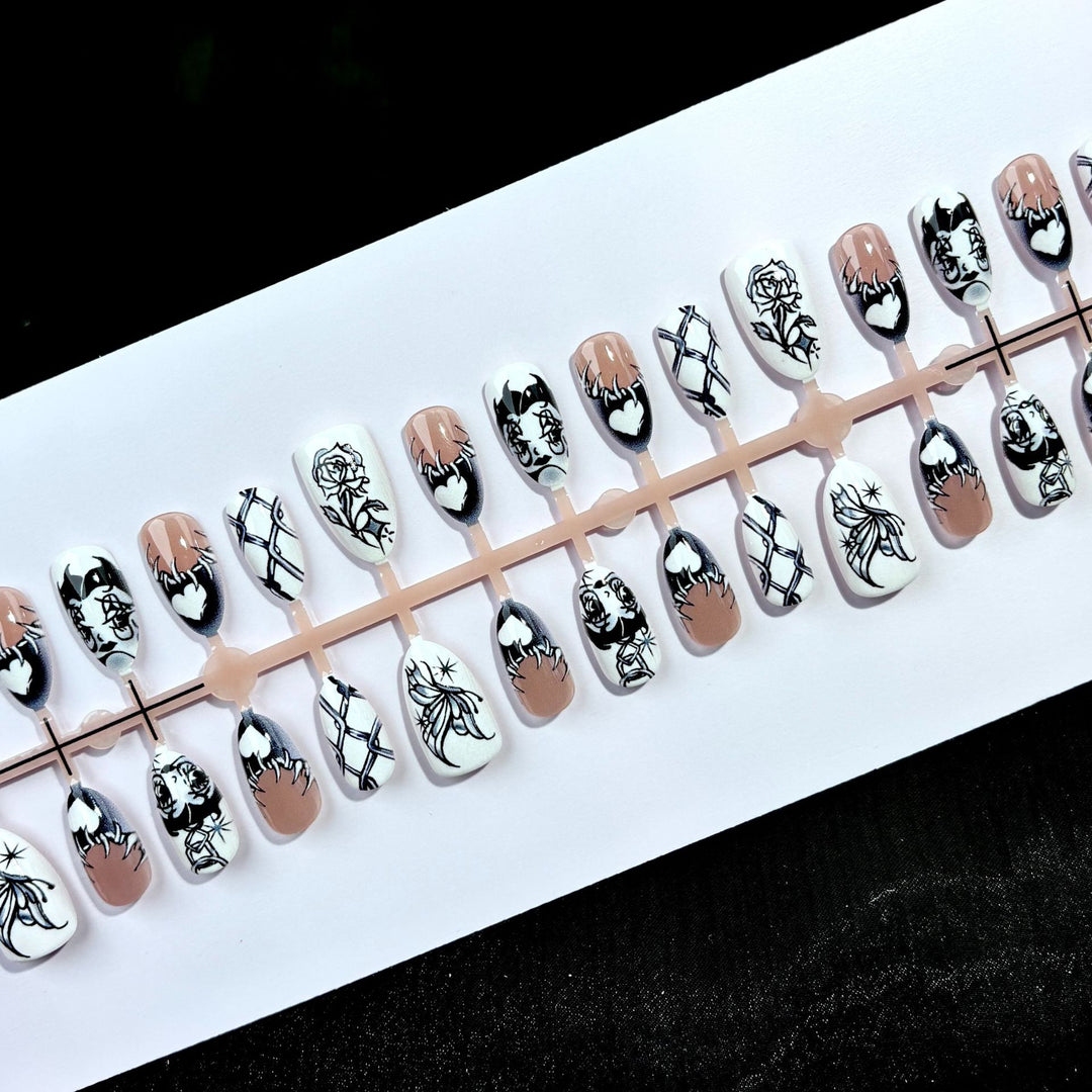 Artistic Press-On Nail Art Set with Unique Graphic Designs