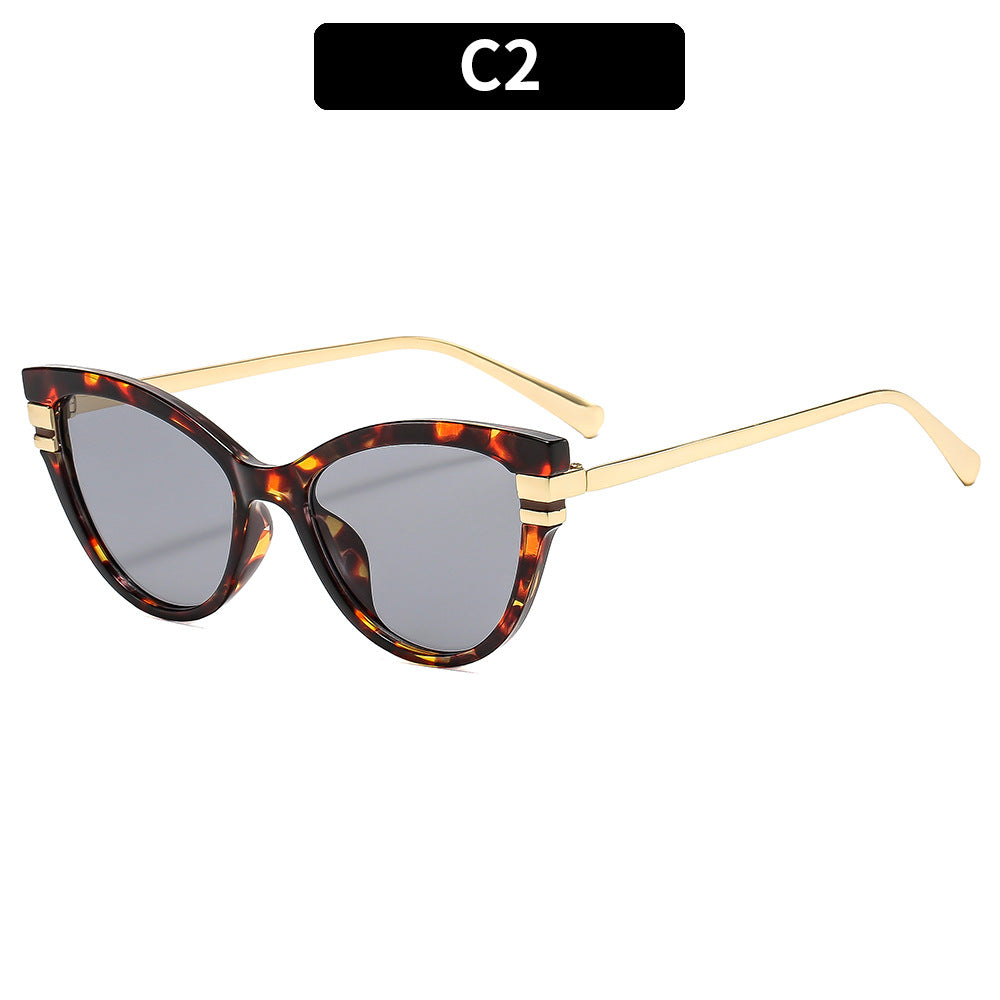 Stylish Cat-Eye Sunglasses with Decorative Gold Accents