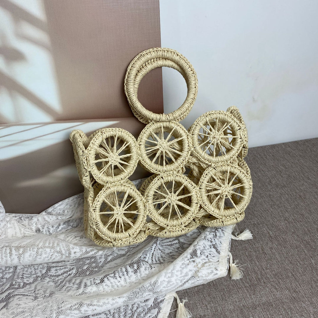 Artisan woven basket bag with striking wheel pattern Stornfield