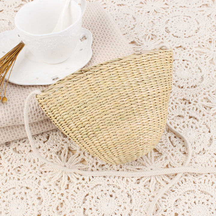 Handcrafted straw clutch with elegant design Stornfield