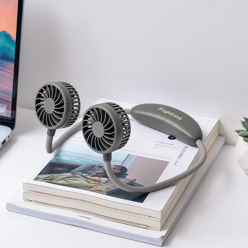 Unisex portable neck fan with dual fan heads, flexible neckband, quiet brushless motor, and USB charging function Stornfield