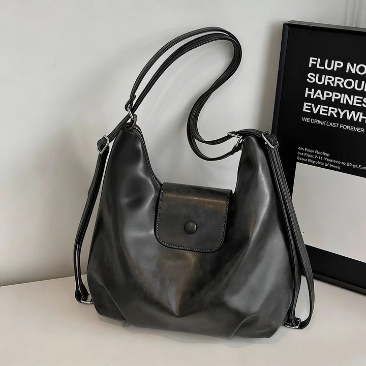 Modern shoulder bag with practical flap closure Stornfield