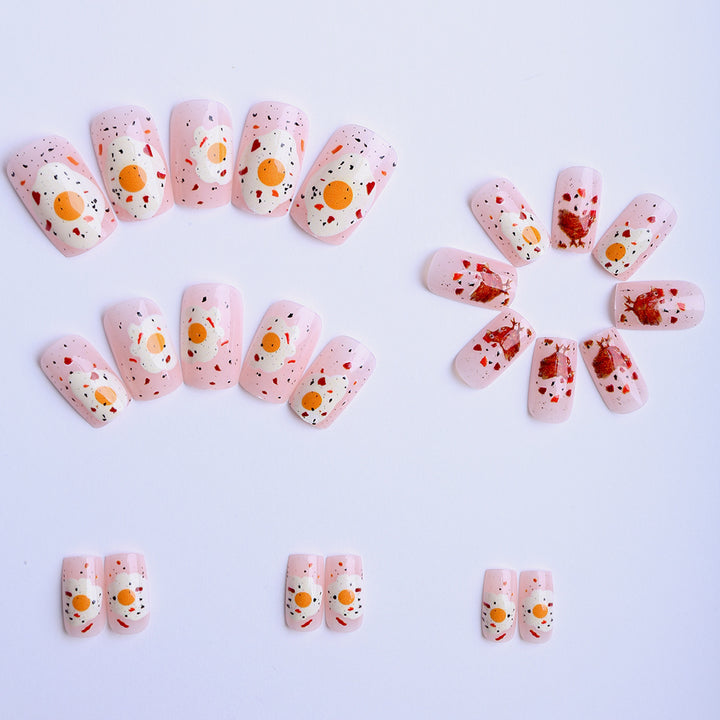 Artificial nails with playful breakfast motif Stornfield