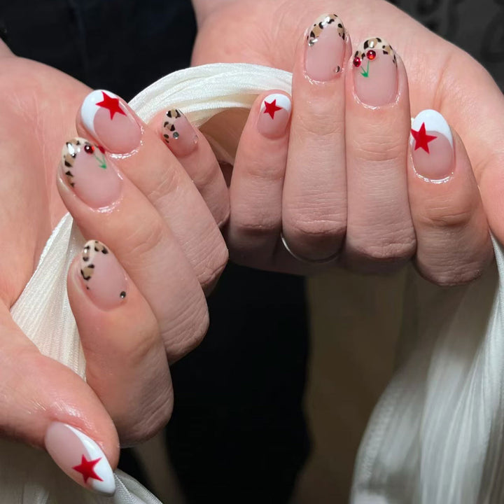 Artistic Animal Print and Star Nail Art