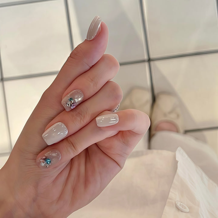 Artificial nails with elegant jewelry accents Stornfield