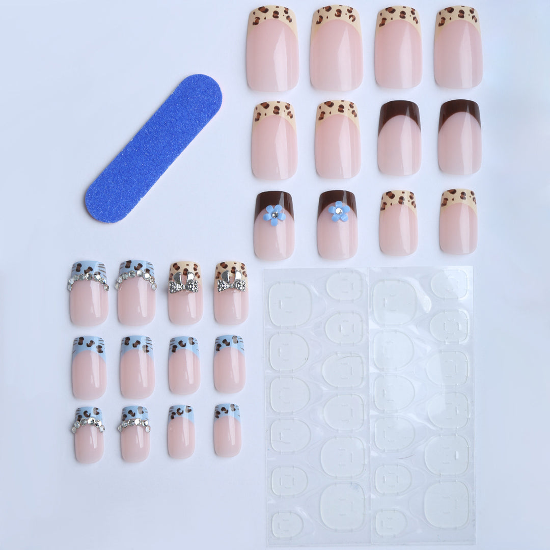Artificial nails with stylish animal patterns and sparkling accents Stornfield