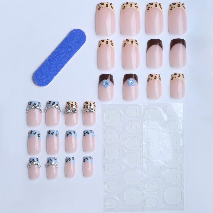 Artificial nails with stylish animal patterns and sparkling accents Stornfield
