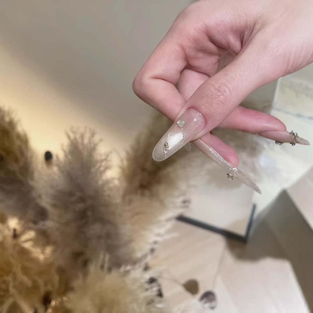 Artistic Stiletto Nail Art Extensions with Rhinestone Accents