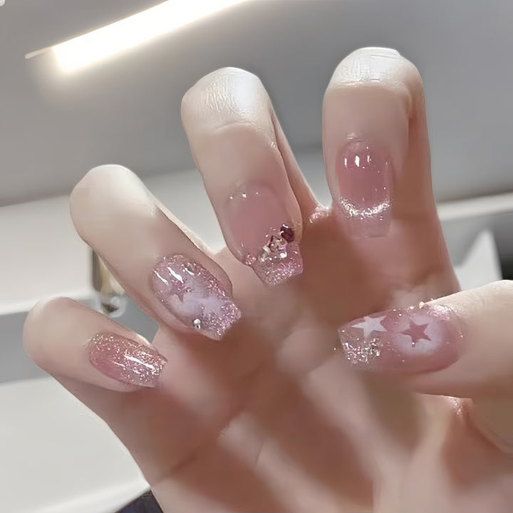 Artificial nails with playful animal motif and elegant French tip design Stornfield