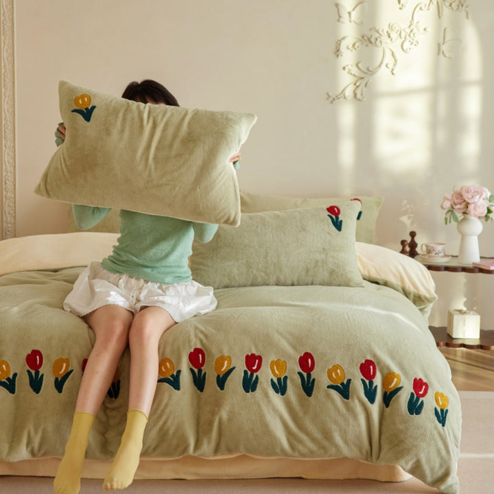 Plush duvet cover set with embroidered tulips, cozy teddy fleece, reversible function, and matching pillowcases