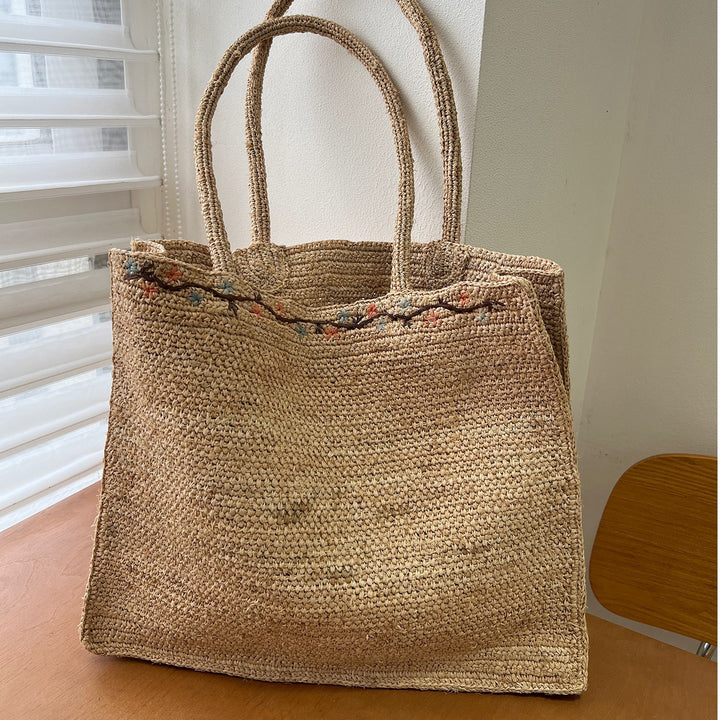 Handcrafted knitted bag with floral design Stornfield