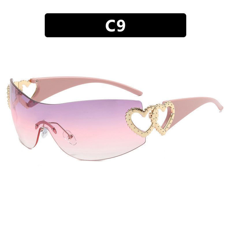 Ladies sporty sunglasses in trendy shield design with heart accents Stornfield