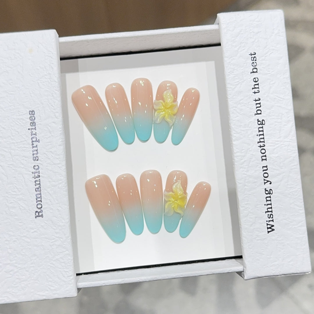 Artificial nails with enchanting ombre effect and floral accents Stornfield