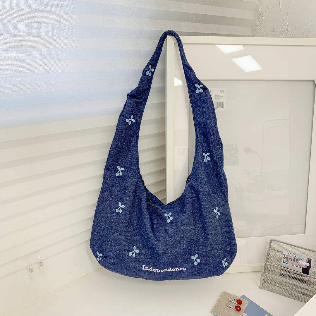 Comfortable shoulder bag with original embroidery motif Stornfield