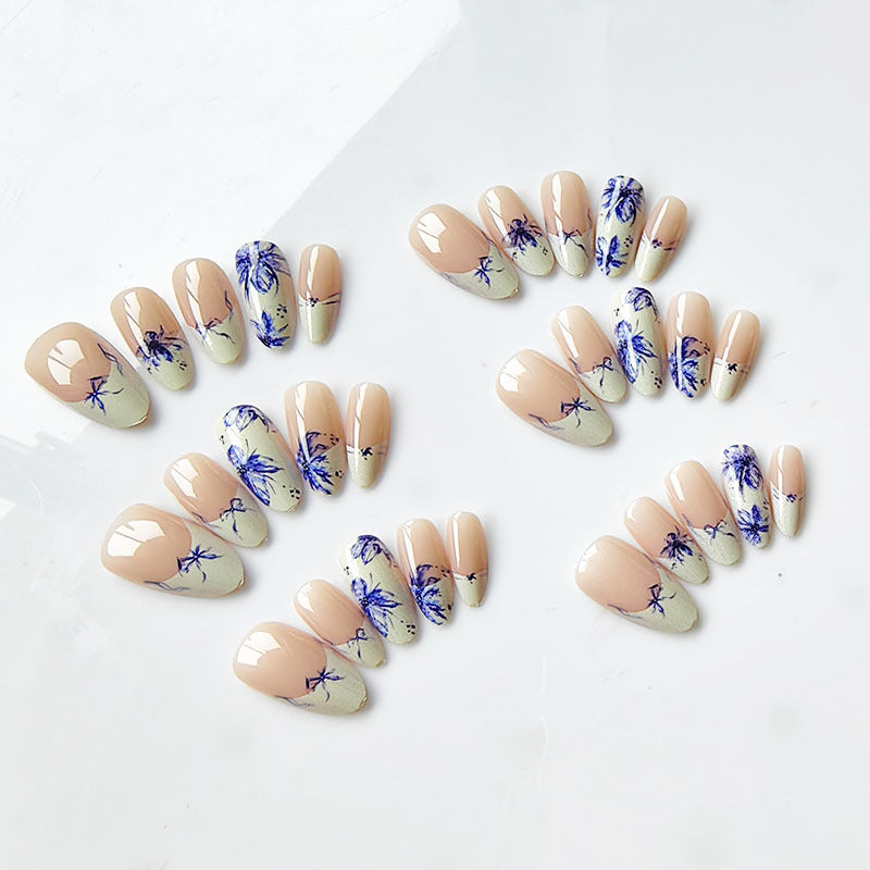 Artificial nails with floral pattern and elegant accents Stornfield