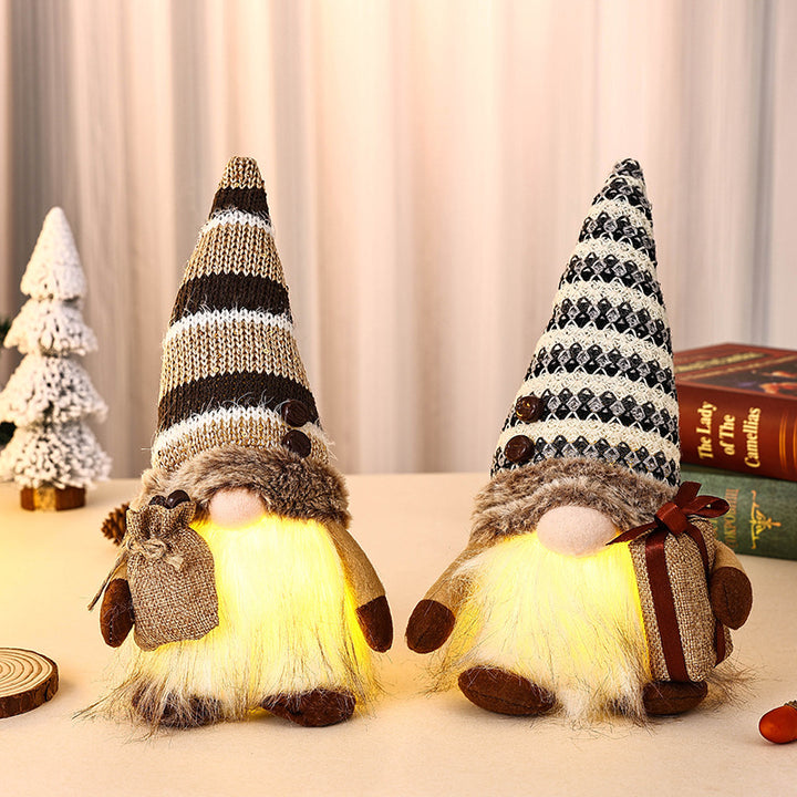 Decorative Christmas gnome with gift package Stornfield