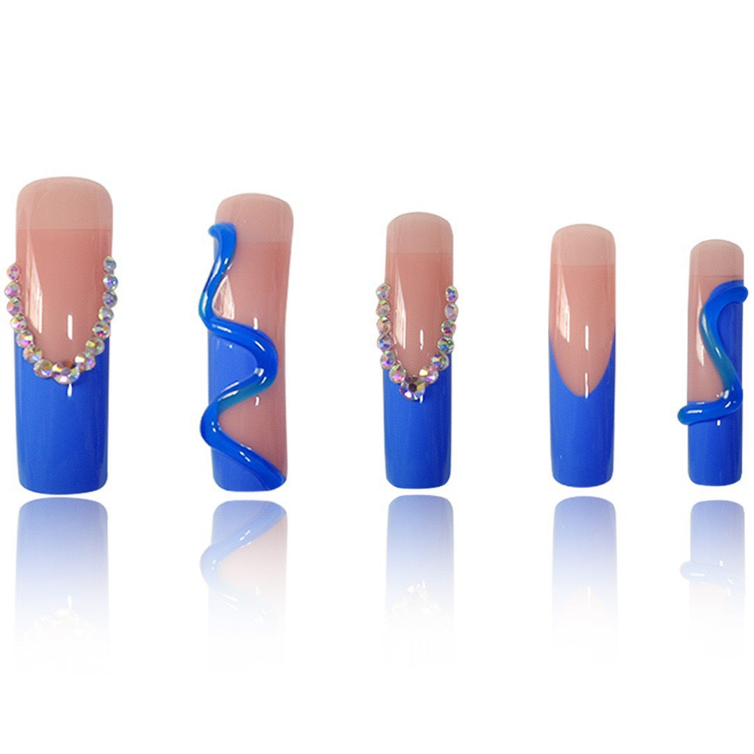 Creative Stiletto Nail Enhancements with Aqua-Gem Accents Stornfield