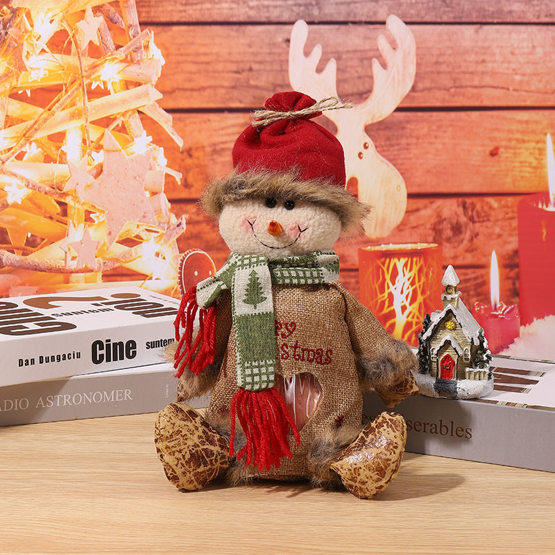 Cute Christmas gnome with gift sack Stornfield