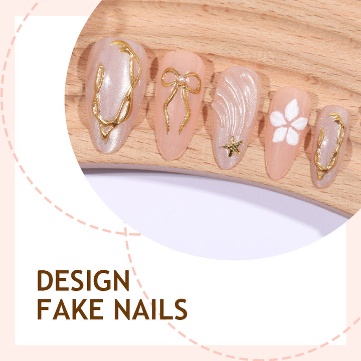 Artificial nail set with elegant floral detail embellishments Stornfield