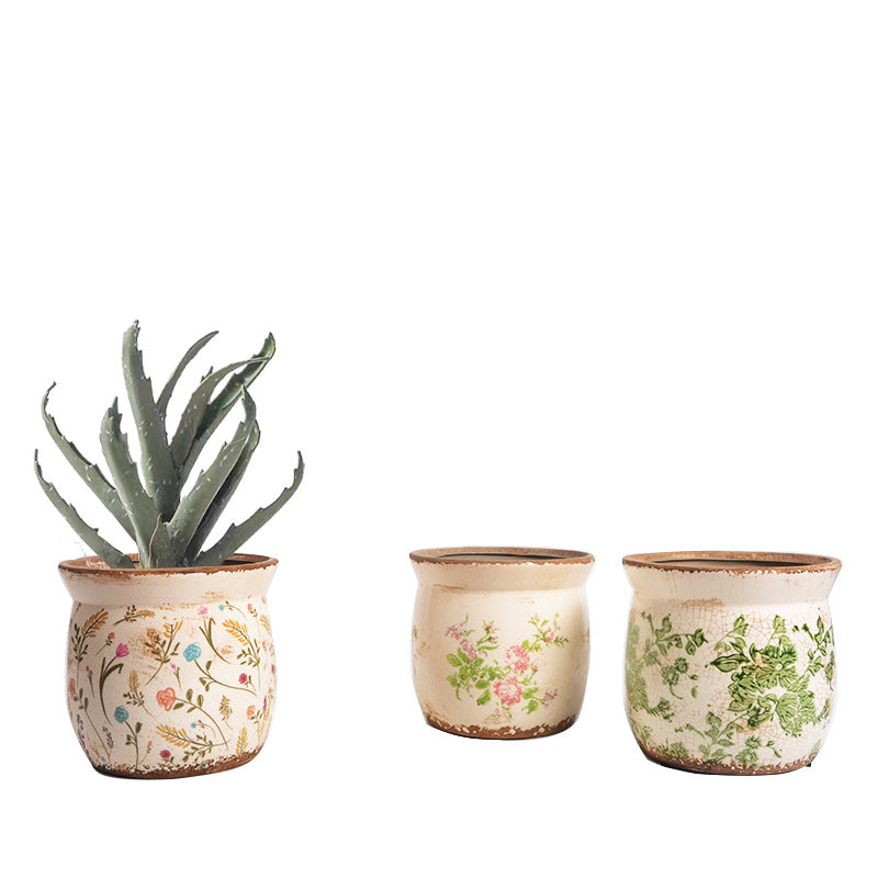 Decorative ceramic plant container with artistic design Stornfield