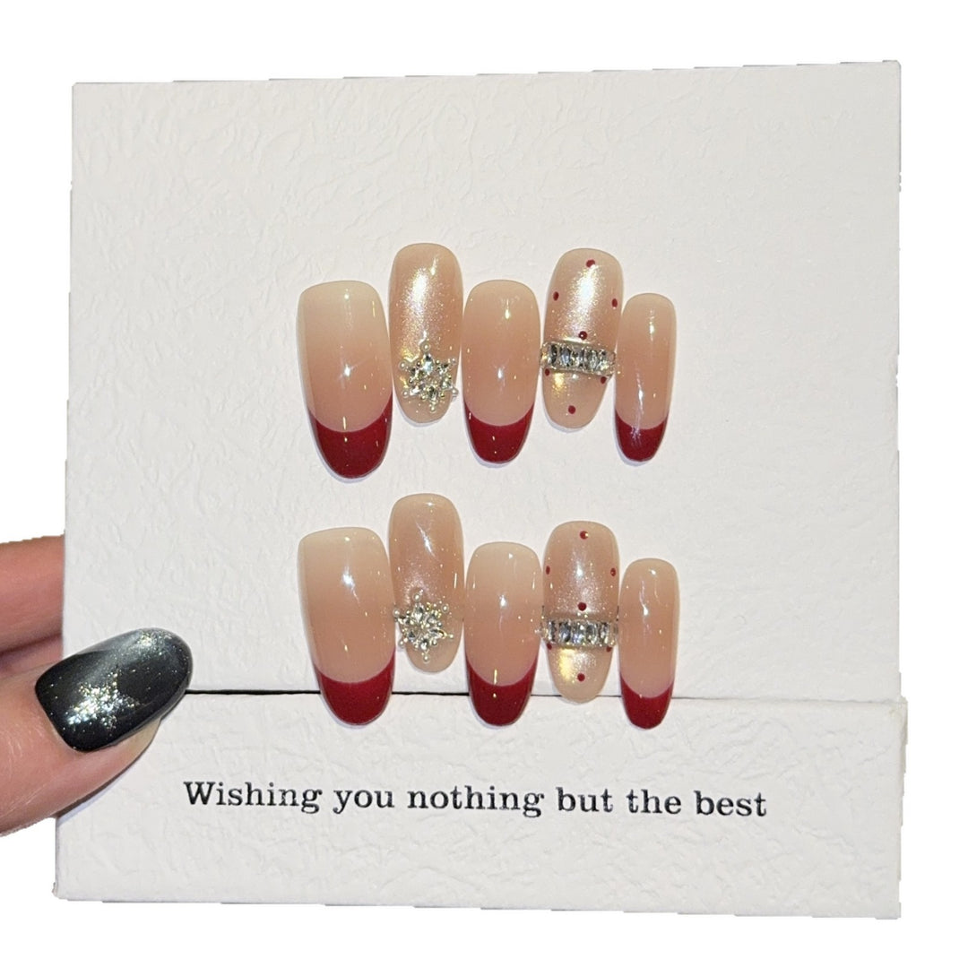 Artificial nails with festive design and rhinestone details Stornfield