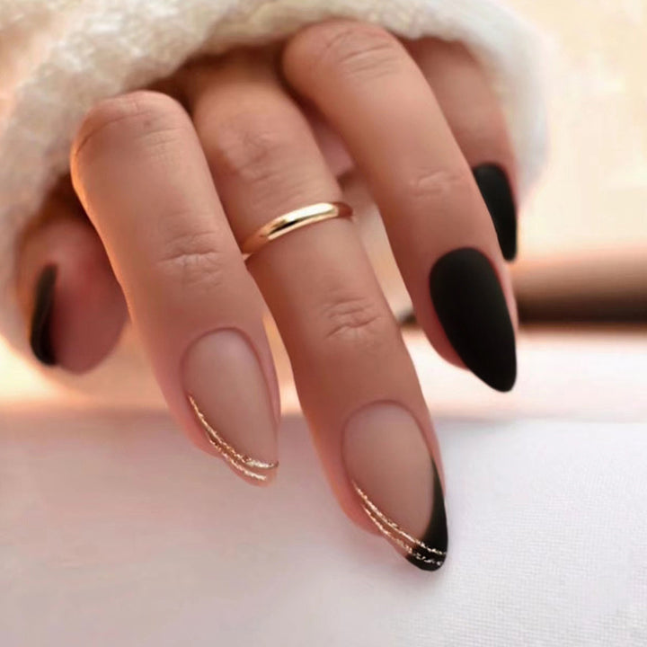 Elegant Stiletto Nail Extensions with Gold Accents