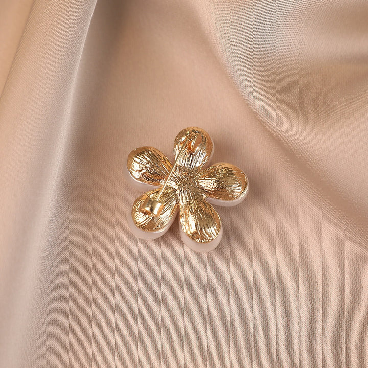 Elegant flower brooch with pearl accents Stornfield